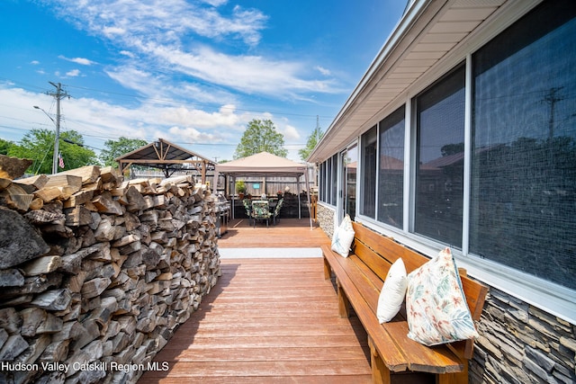 2-6 Old Firehouse Rd, Plattekill, NY 12568 - wooden deck featuring a gazebo and outdoor dining area