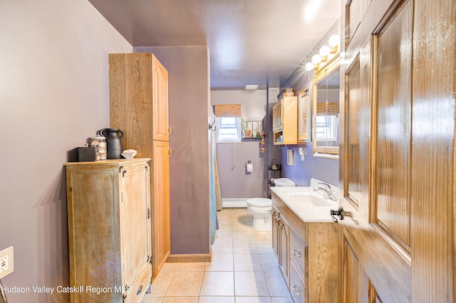 2-6 Old Firehouse Rd, Plattekill, NY 12568 - bathroom featuring baseboard heating, tile patterned floors, and vanity