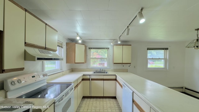 13 Birk St, Acra, NY 12405 - kitchen featuring white appliances, track lighting, exhaust hood, light countertops, and light floors