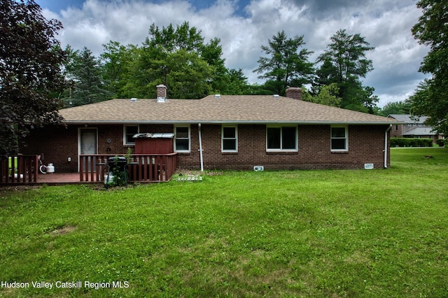 13 Birk St, Acra, NY 12405 - back of house featuring a chimney, a lawn, brick siding, and a deck