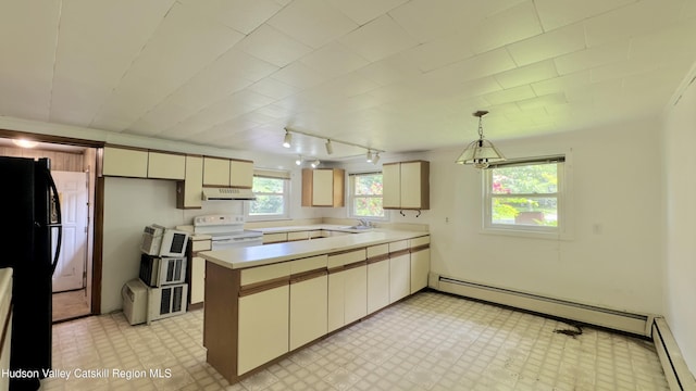 13 Birk St, Acra, NY 12405 - kitchen featuring white electric range oven, range hood, a peninsula, and a baseboard heating unit