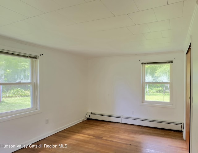 13 Birk St, Acra, NY 12405 - spare room featuring a baseboard radiator and wood finished floors