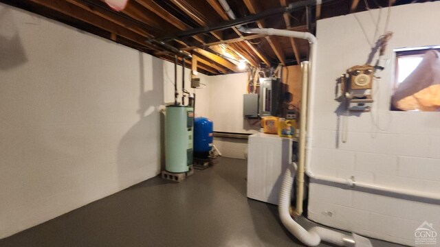159 Toles Hollow Rd, Conesville, NY 12076 - basement featuring water heater, a water pressure tank, concrete block wall, and electric panel