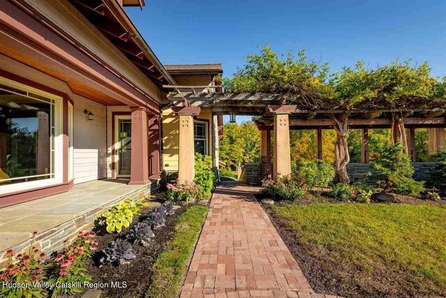 exterior space with a pergola