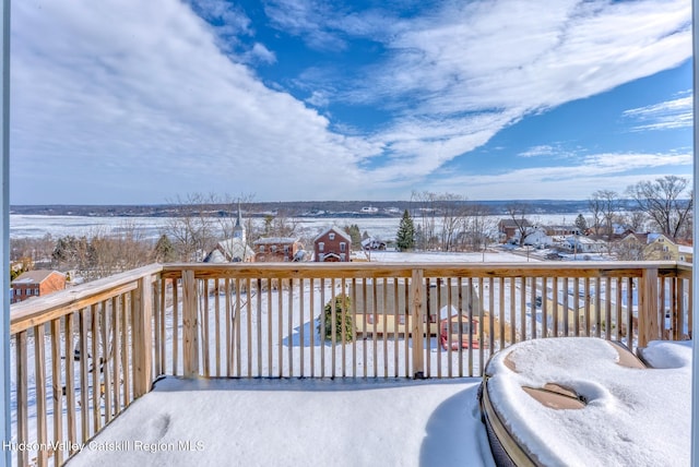 view of snow covered deck