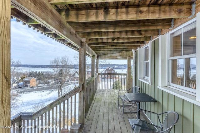 view of snow covered deck