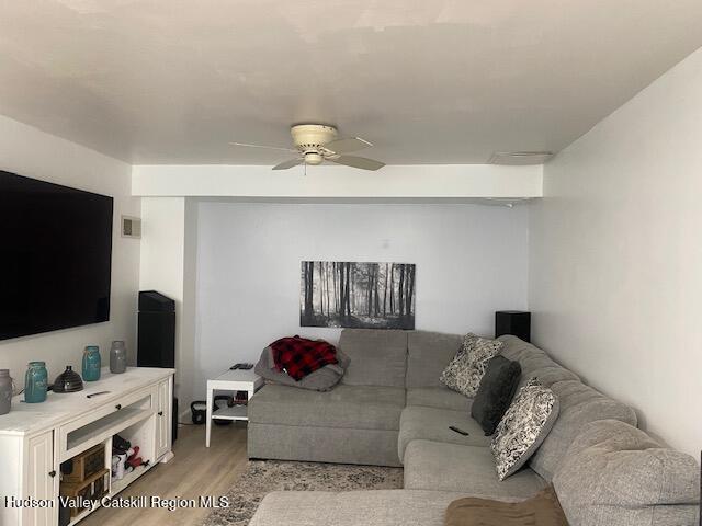 87 Dock St, Saugerties, NY 12477 - living area with light wood-type flooring and ceiling fan