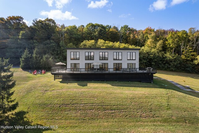 back of house with a yard