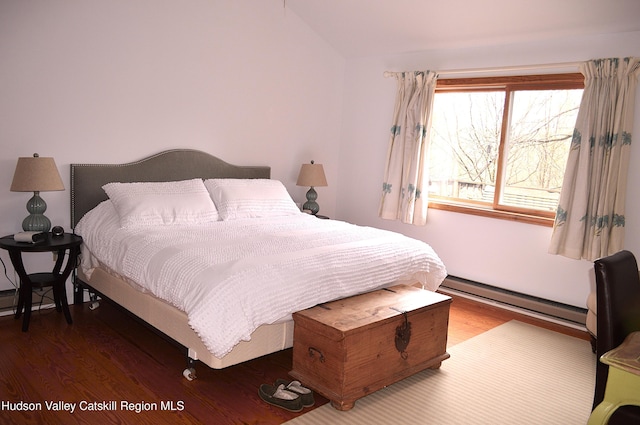 100 Clear Spring Ln, Fleischmanns, NY 12406 - bedroom with a baseboard heating unit, wood finished floors, and vaulted ceiling