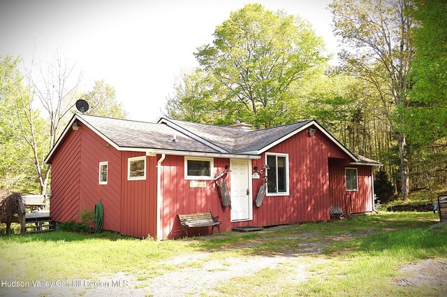 100 Clear Spring Ln, Fleischmanns, NY 12406 - view of side of home featuring roof with shingles and a lawn