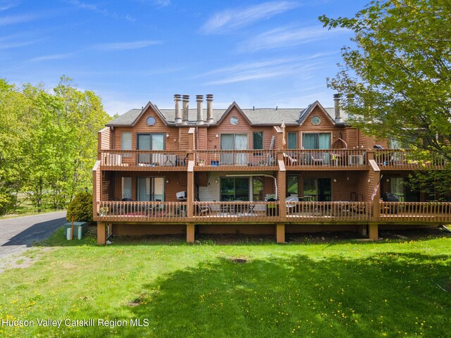 11 Quads Way, Windham, NY 12496 - back of house featuring a balcony, a yard, and a chimney