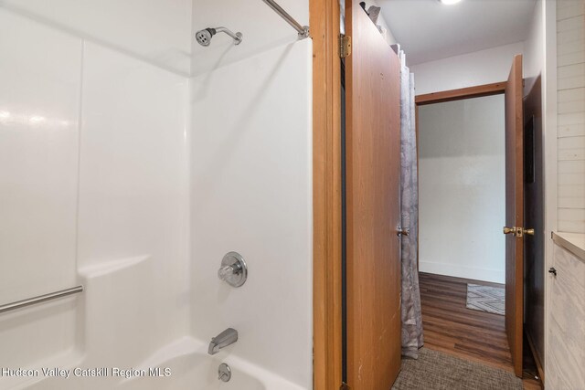 11 Quads Way, Windham, NY 12496 - full bath featuring shower / washtub combination and wood finished floors