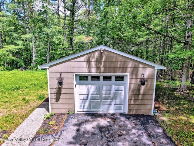 534 Rte 145, Cairo, NY 12413 - detached garage with driveway and a wooded view