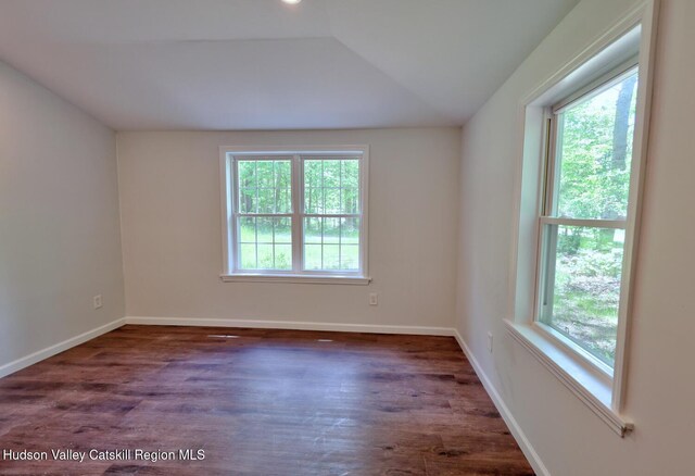 534 Rte 145, Cairo, NY 12413 - spare room with healthy amount of natural light, wood finished floors, baseboards, and vaulted ceiling