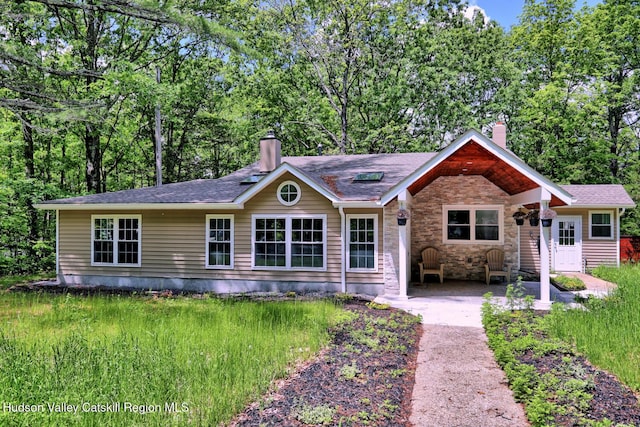 534 Rte 145, Cairo, NY 12413 - ranch-style house with a chimney, a patio area, and stone siding