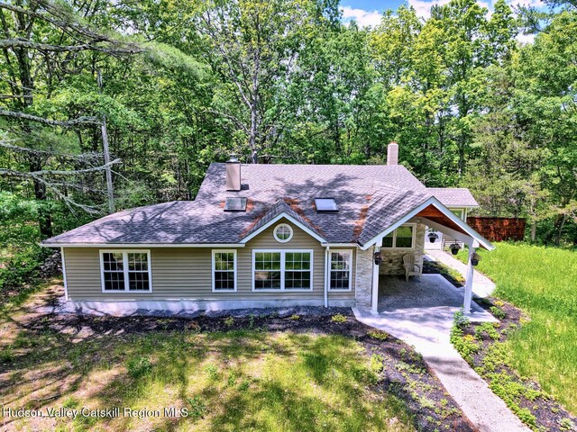 534 Rte 145, Cairo, NY 12413 - view of front facade with a chimney, roof with shingles, an attached carport, and driveway