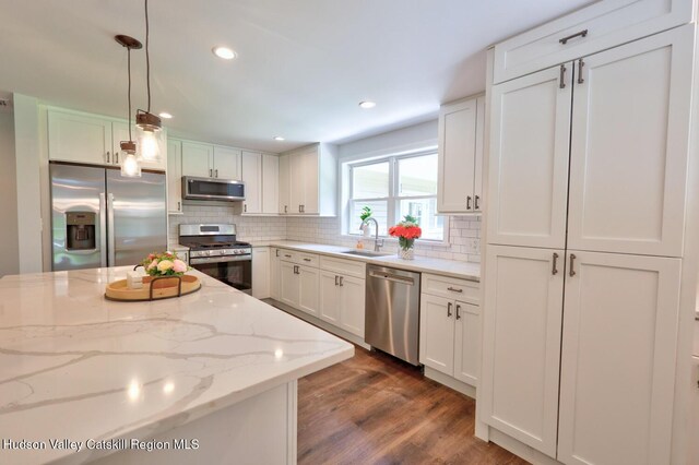 534 Rte 145, Cairo, NY 12413 - kitchen with appliances with stainless steel finishes, a sink, decorative backsplash, dark wood-style flooring, and recessed lighting