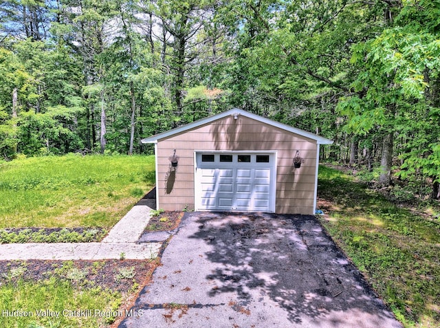 534 Rte 145, Cairo, NY 12413 - detached garage featuring driveway and a forest view