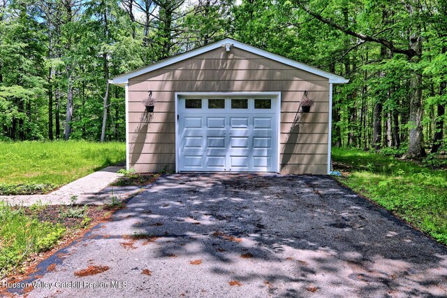 534 Rte 145, Cairo, NY 12413 - detached garage with asphalt driveway and a wooded view