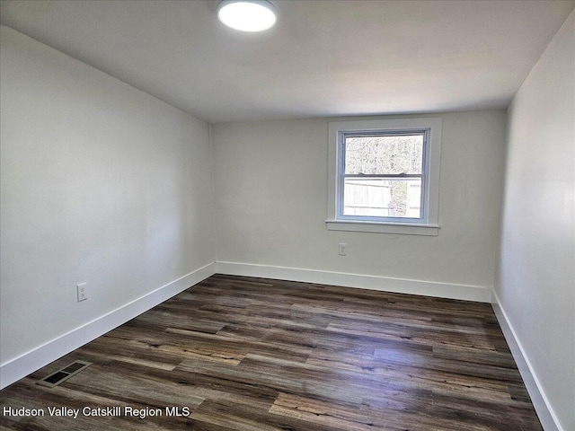 603-607 Old Stage Rd, Saugerties, NY 12477 - unfurnished room featuring visible vents, baseboards, and dark wood-type flooring