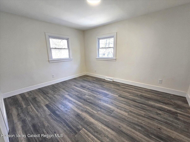 603-607 Old Stage Rd, Saugerties, NY 12477 - spare room featuring a healthy amount of sunlight, baseboards, and dark wood finished floors