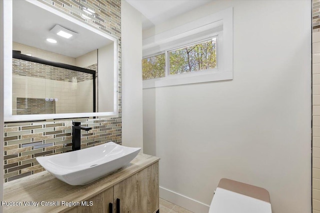 603-607 Old Stage Rd, Saugerties, NY 12477 - full bathroom with a sink, baseboards, a shower stall, and toilet