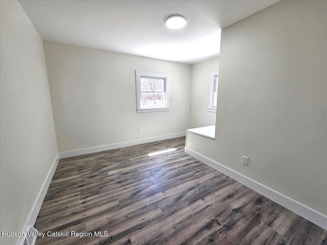 603-607 Old Stage Rd, Saugerties, NY 12477 - unfurnished room with baseboards and dark wood finished floors