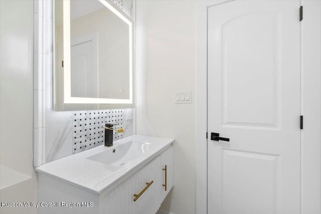 603-607 Old Stage Rd, Saugerties, NY 12477 - bathroom with vanity and tasteful backsplash