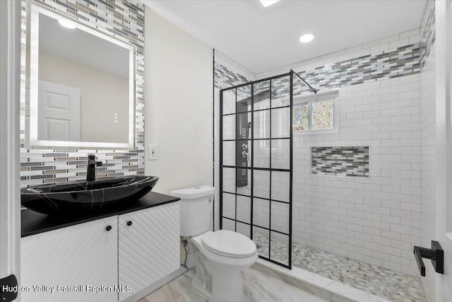 603-607 Old Stage Rd, Saugerties, NY 12477 - bathroom with vanity, toilet, marble finish floor, decorative backsplash, and a stall shower