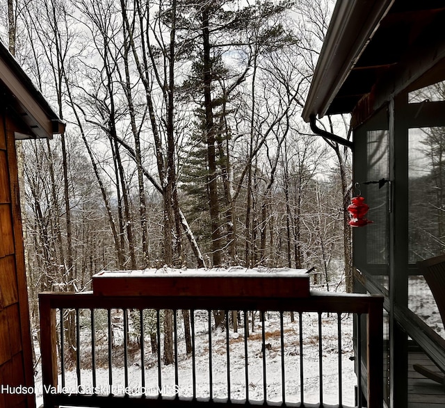 view of snow covered deck