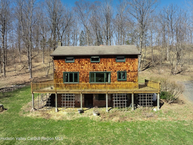 592 County Route 6, High Falls, NY 12440 - view of front of property with a chimney, a shingled roof, a front lawn, and a wooden deck
