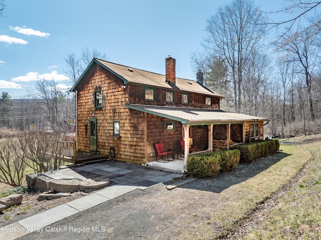 592 County Route 6, High Falls, NY 12440 - rear view of house featuring a chimney
