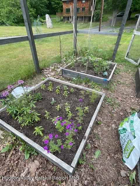 592 County Route 6, High Falls, NY 12440 - view of yard featuring fence and a vegetable garden