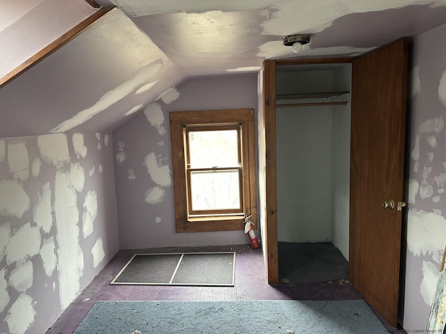 bonus room featuring vaulted ceiling