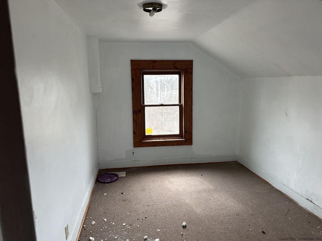 bonus room with vaulted ceiling