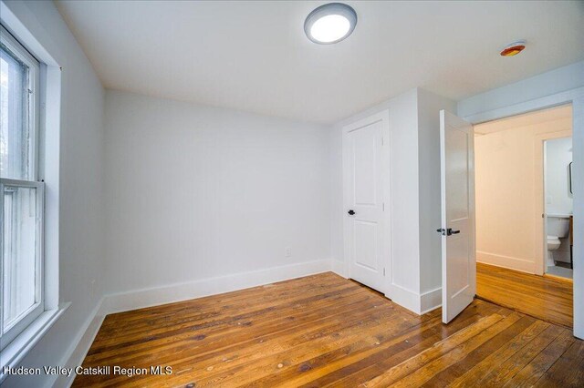 1792 State Route 213, Ulster Park, NY 12487 - unfurnished bedroom with wood-type flooring and baseboards