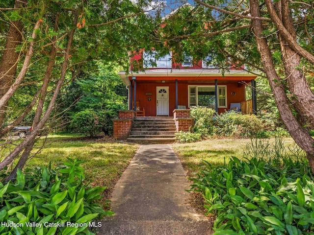 2481 Rte 145, East Durham, NY 12423 - view of front facade featuring a porch