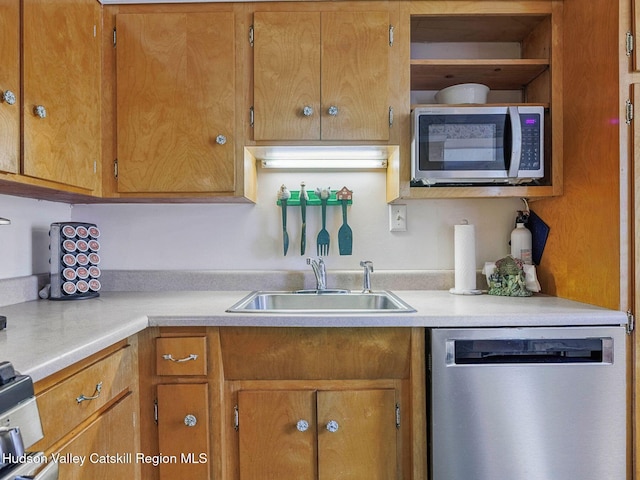 2481 Rte 145, East Durham, NY 12423 - kitchen featuring stainless steel appliances, light countertops, brown cabinetry, and open shelves