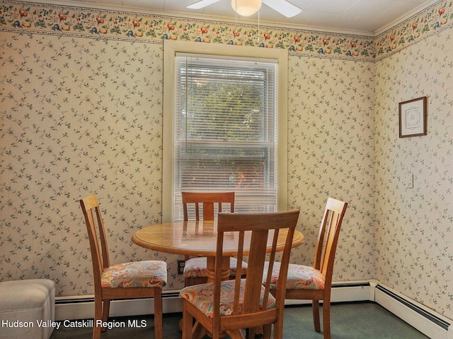 2481 Rte 145, East Durham, NY 12423 - dining room with wallpapered walls, ceiling fan, ornamental molding, and a baseboard heating unit