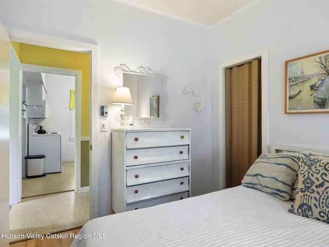 2481 Rte 145, East Durham, NY 12423 - bedroom featuring washer / clothes dryer and ornamental molding