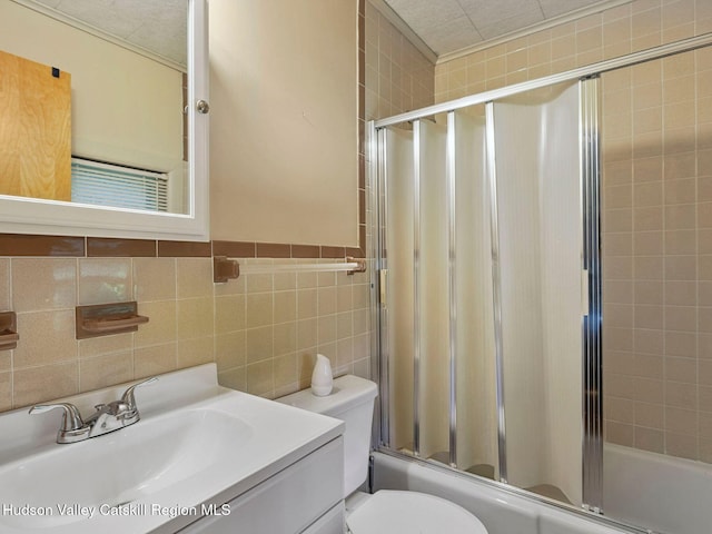 2481 Rte 145, East Durham, NY 12423 - bathroom with shower / bath combination with glass door, vanity, and tile walls