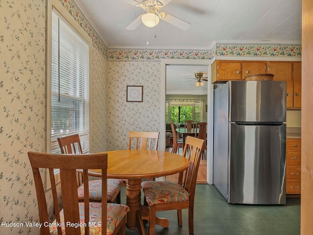 2481 Rte 145, East Durham, NY 12423 - dining area with a ceiling fan, wallpapered walls, and ornamental molding