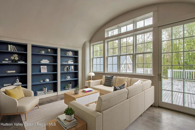 interior space with plenty of natural light, sink, and high vaulted ceiling