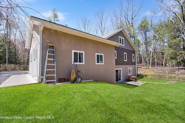 220 John Joy Rd, Woodstock, NY 12498 - rear view of house featuring stucco siding