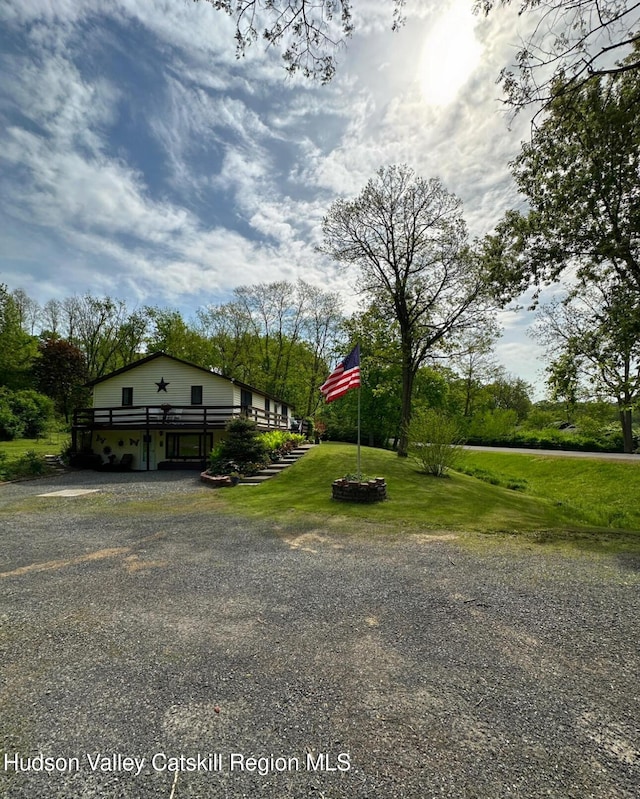 51 Patroon St, Claverack-Red Mills, NY 12513 - view of side of home featuring a yard and gravel driveway