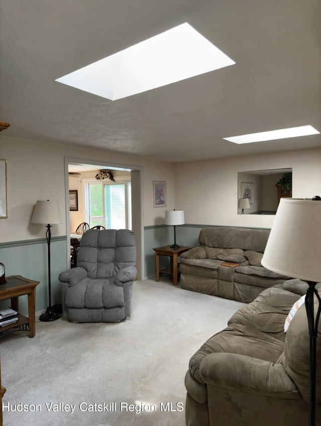 51 Patroon St, Claverack-Red Mills, NY 12513 - carpeted living room featuring a skylight