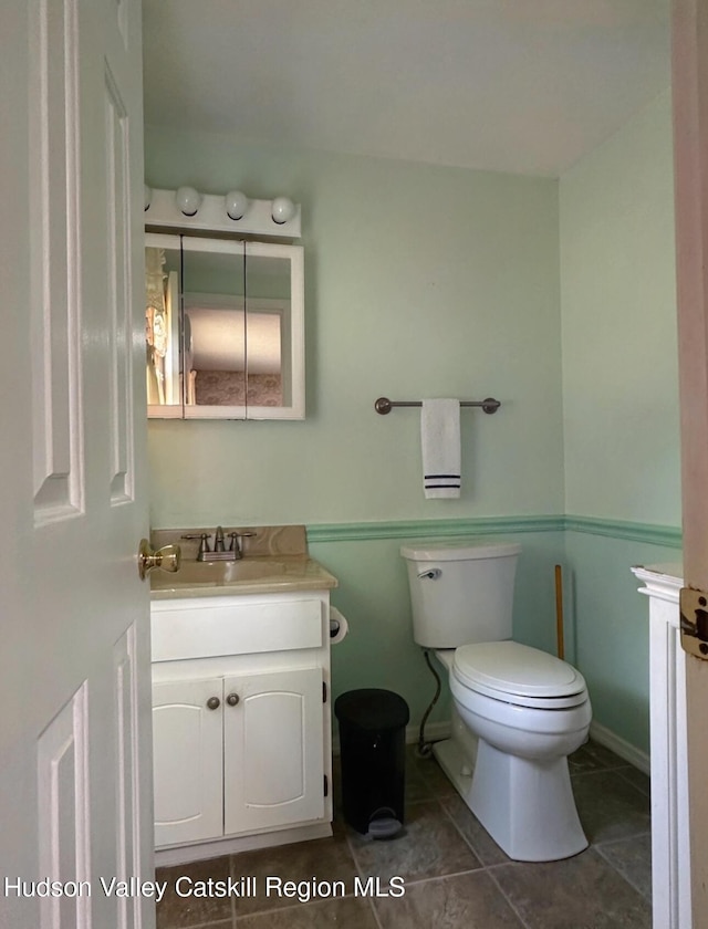 51 Patroon St, Claverack-Red Mills, NY 12513 - half bath featuring tile patterned flooring, vanity, toilet, and baseboards