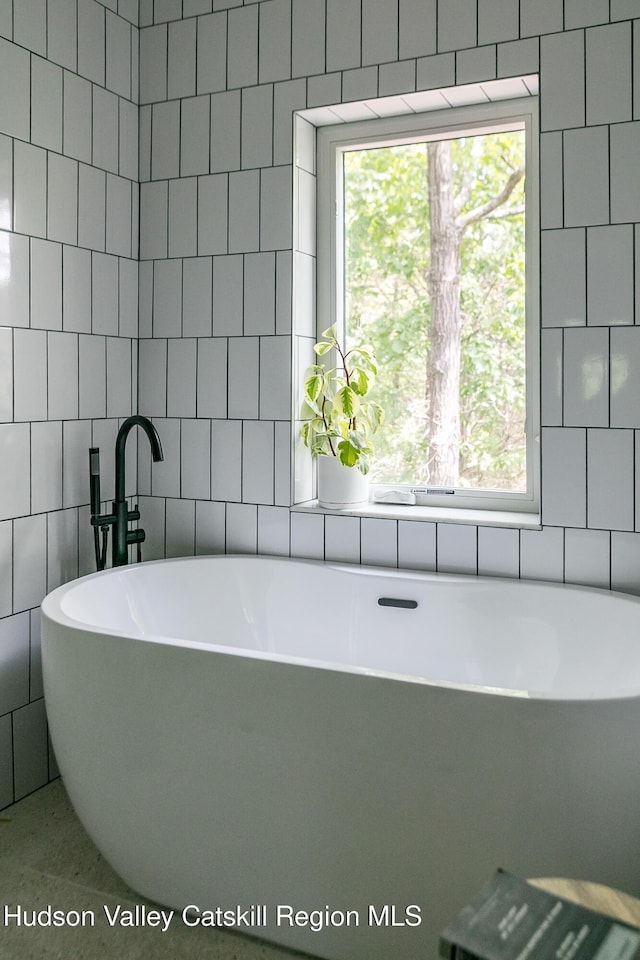 22 Skinner Ln, Catskill, NY 12414 - full bathroom with tile walls and a freestanding bath