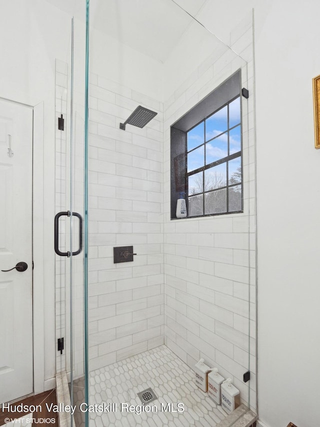 bathroom featuring a stall shower