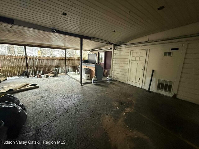 view of patio / terrace with fence and visible vents